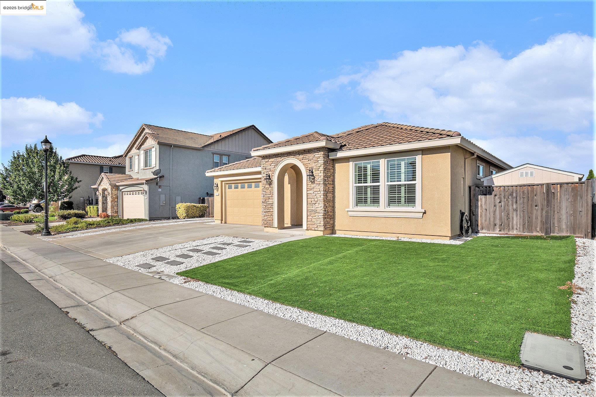 31 Rustic Court Oakley, CA 94561 - Photo 48 of 52 a front view of a house with a garden