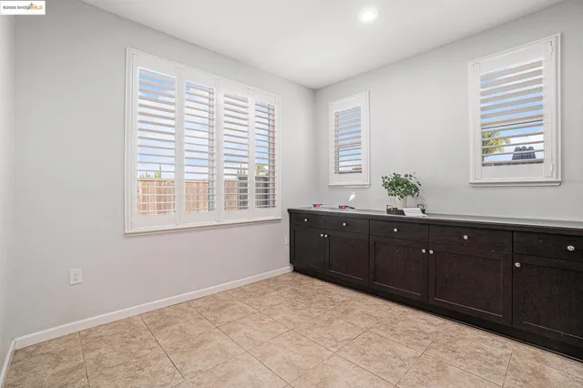 a view of kitchen with furniture and window