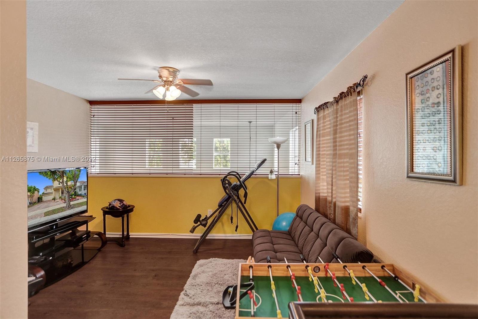 27846 Southwest 142nd Avenue Homestead, FL 33032 - Photo 30 of 56 a bedroom with furniture and a window