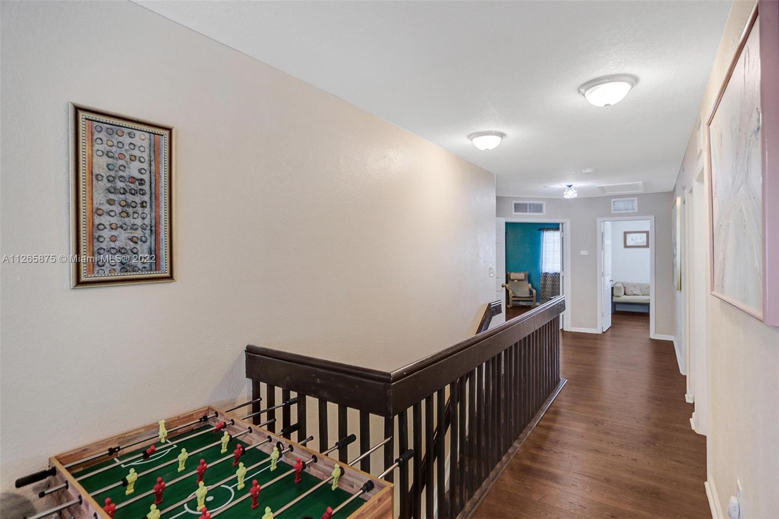 27846 Southwest 142nd Avenue Homestead, FL 33032 - Photo 32 of 56 a view of an entryway with wooden floor