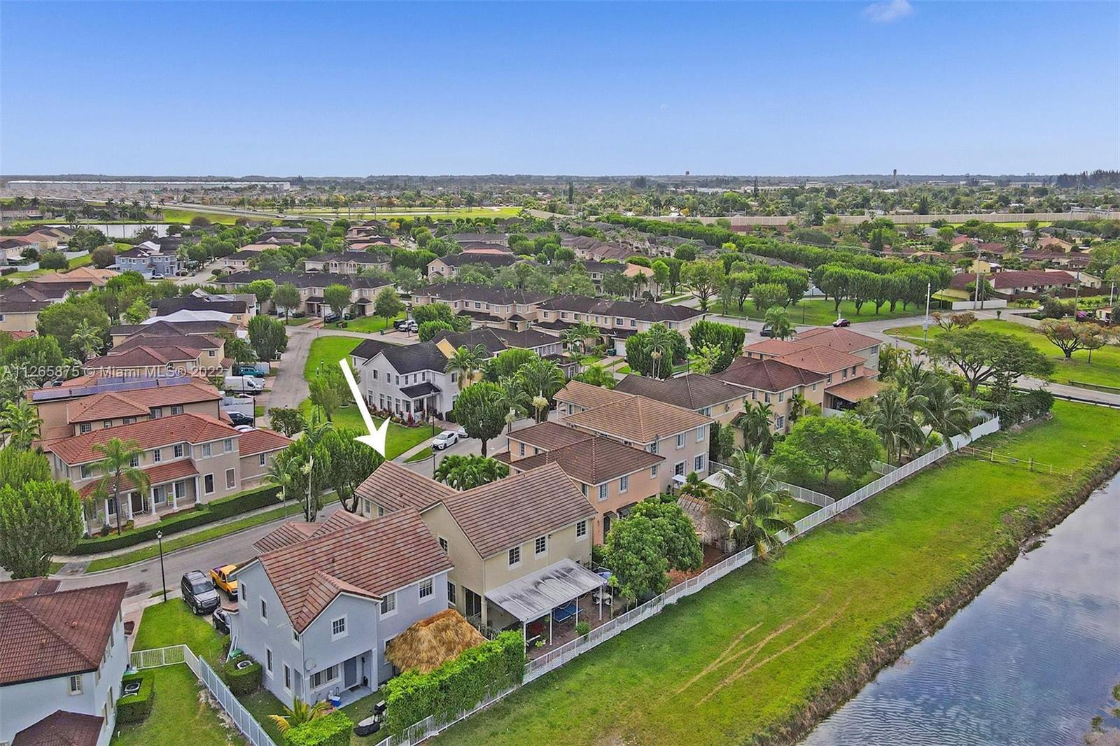 27846 Southwest 142nd Avenue Homestead, FL 33032 - Photo 49 of 56 an aerial view of residential houses with outdoor space and street view