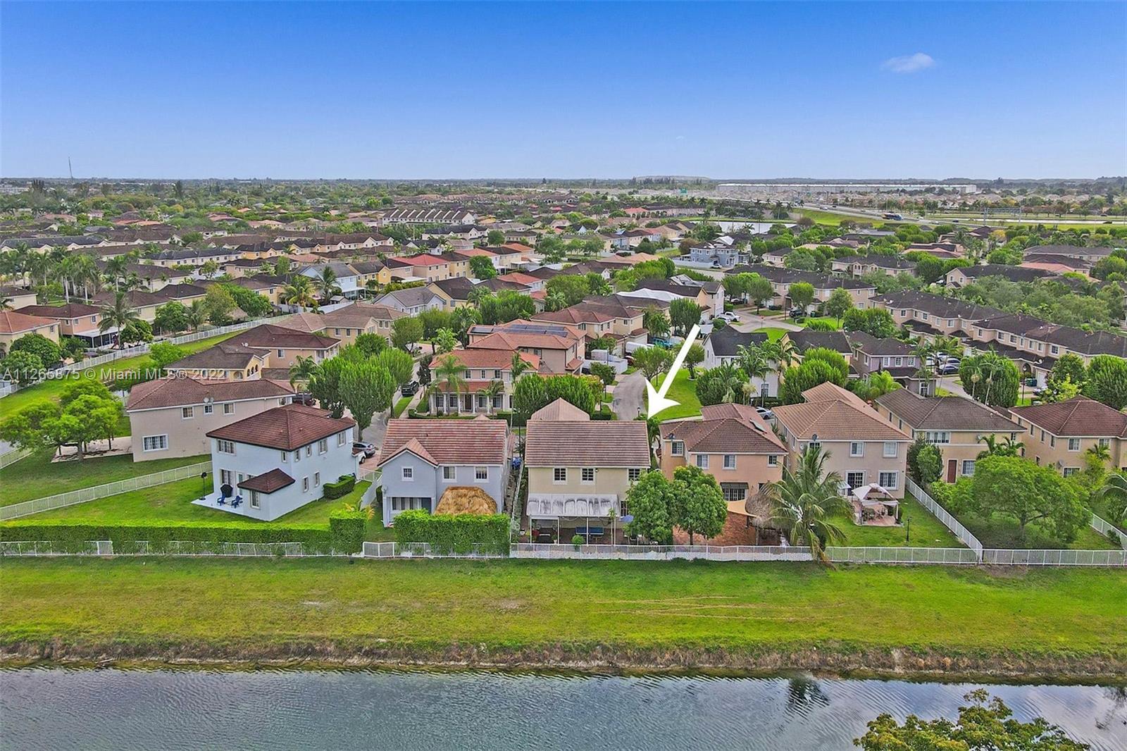 27846 Southwest 142nd Avenue Homestead, FL 33032 - Photo 51 of 56 an aerial view of a house with a garden