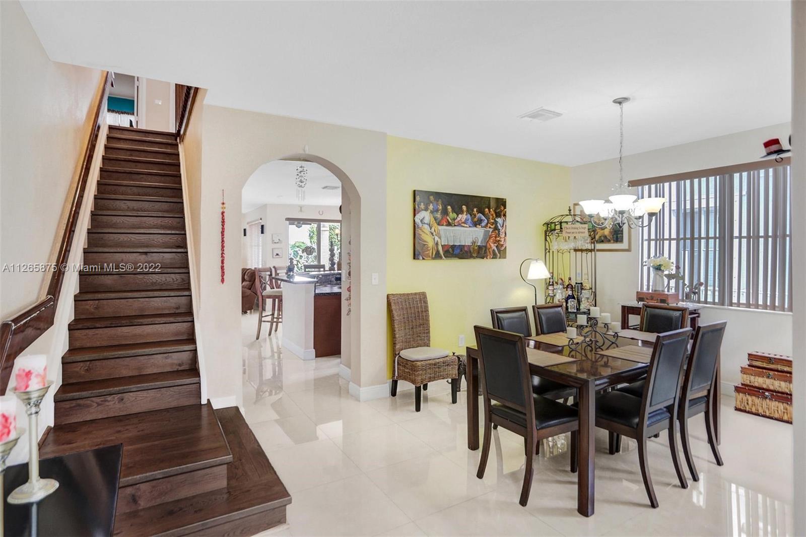 27846 Southwest 142nd Avenue Homestead, FL 33032 - Photo 9 of 56 a view of a dining room with furniture