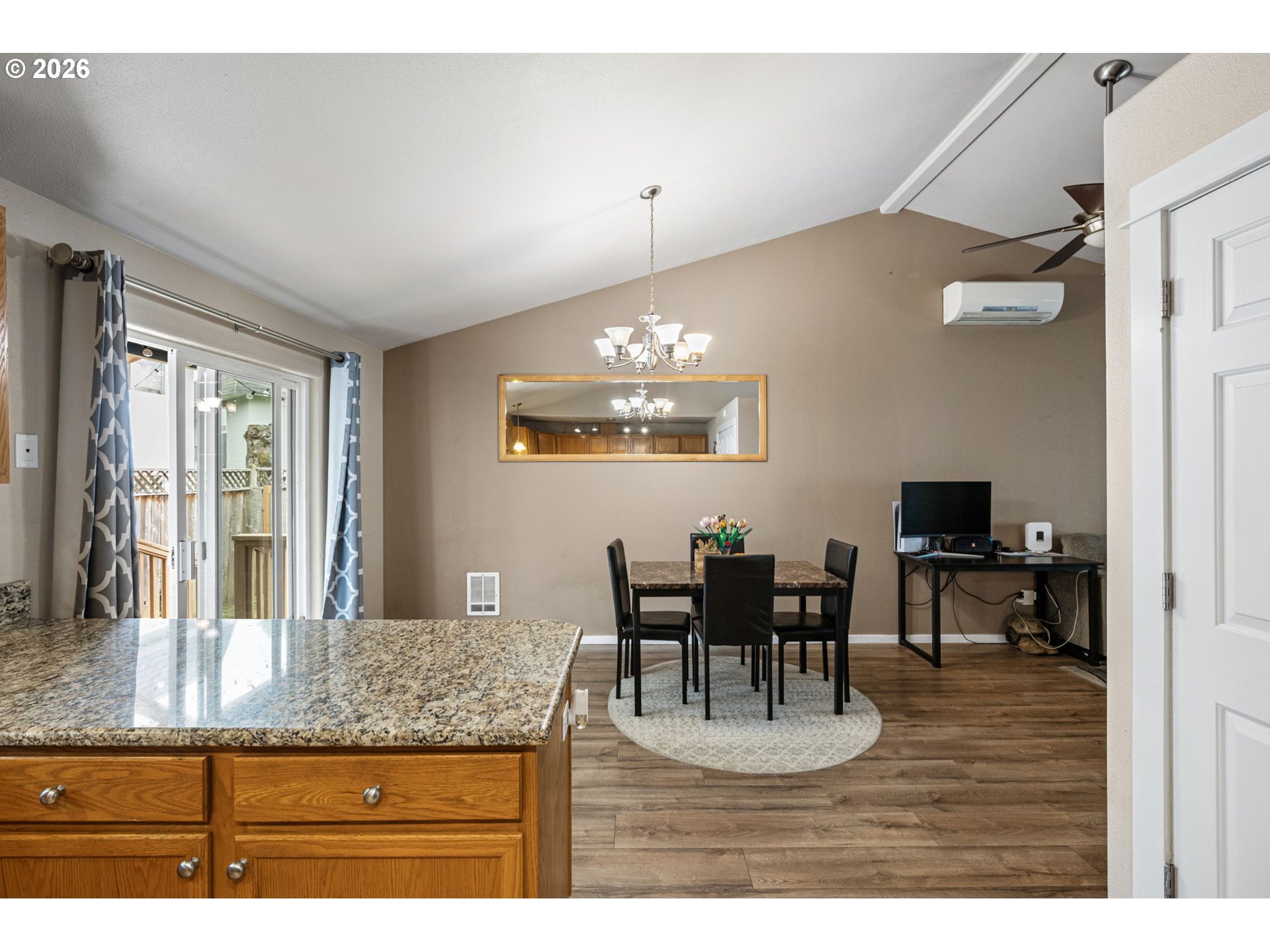 1055 Ash Grove Loop Creswell, OR 97426 - Photo 14 of 33 a view of dining table and chairs in a room