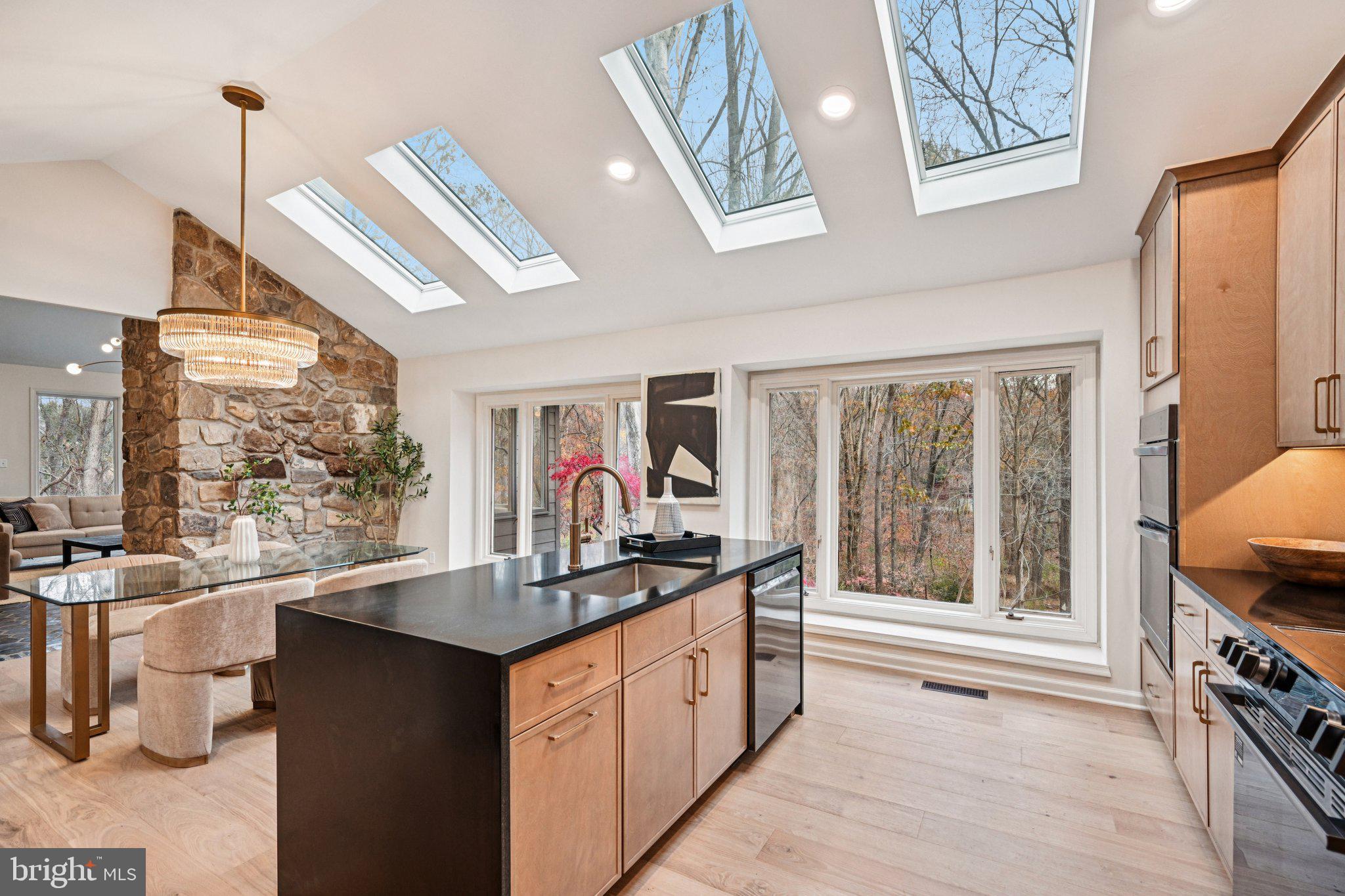 38 Ringfield Road Chadds Ford, PA 19317 - Photo 15 of 50 a kitchen with a sink stove and cabinets