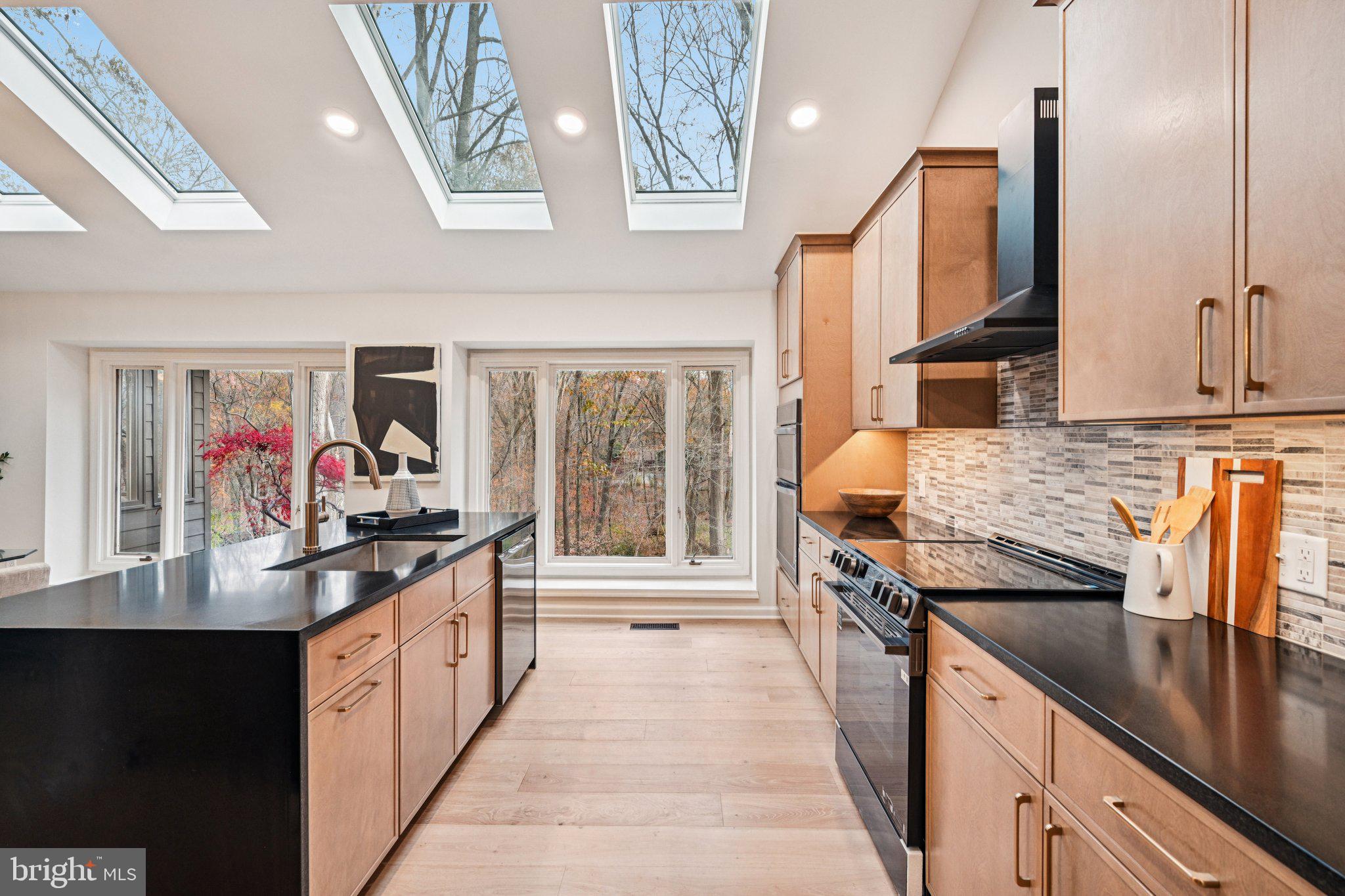 38 Ringfield Road Chadds Ford, PA 19317 - Photo 16 of 50 a kitchen with granite countertop lots of counter top space and stainless steel appliances