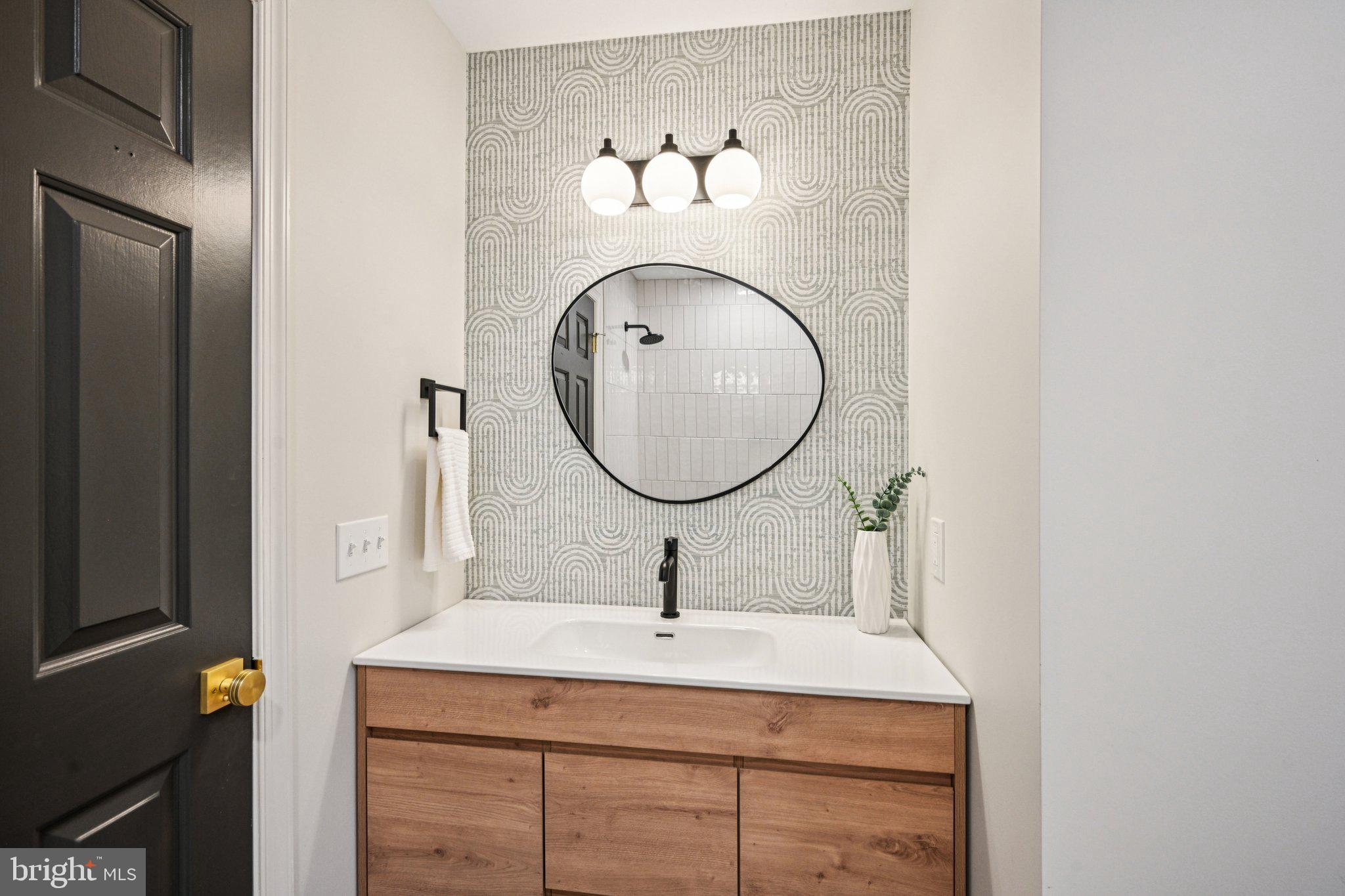 38 Ringfield Road Chadds Ford, PA 19317 - Photo 32 of 50 a bathroom with a sink and mirror