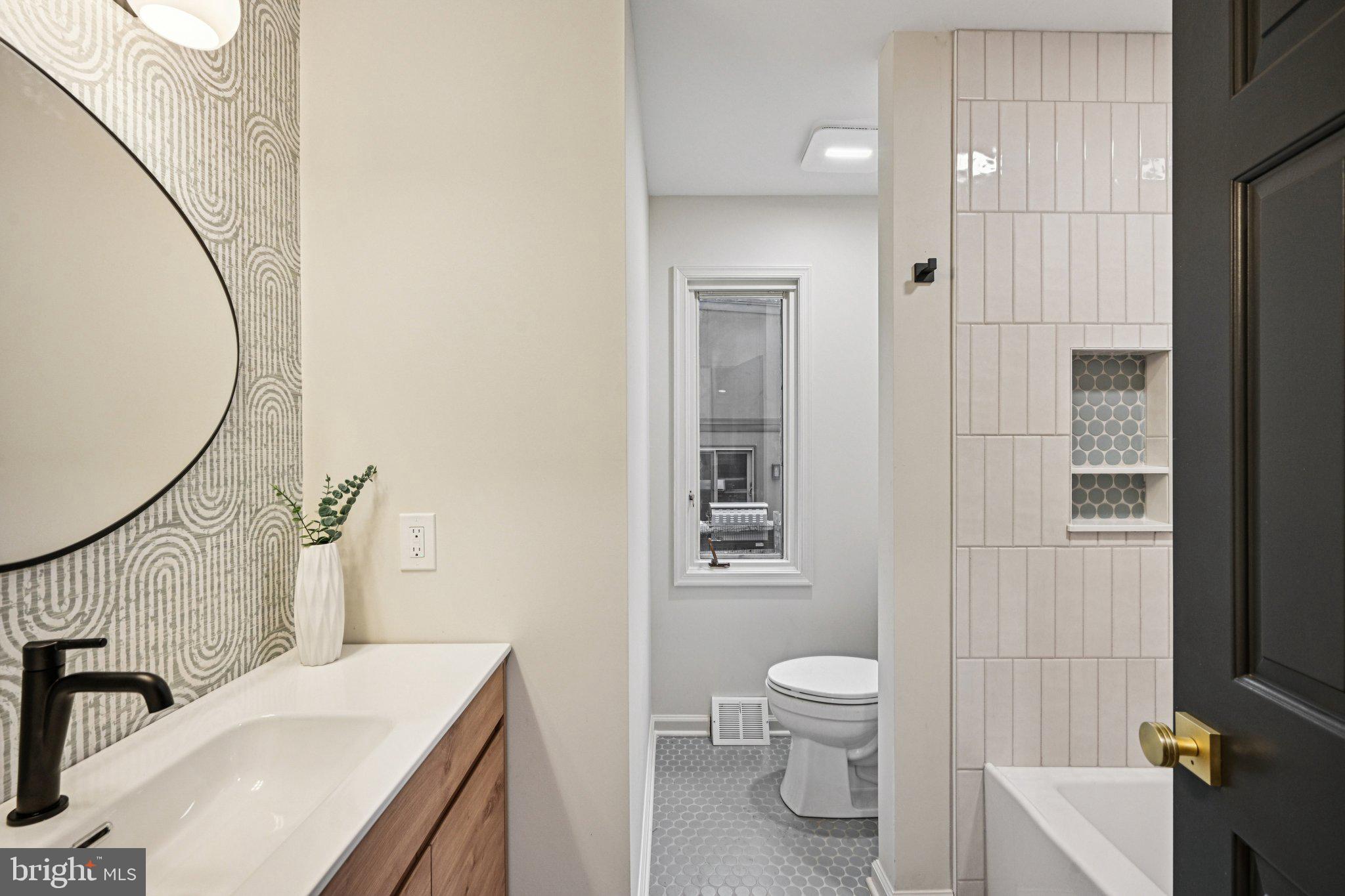 38 Ringfield Road Chadds Ford, PA 19317 - Photo 33 of 50 a bathroom with a sink a toilet and shower