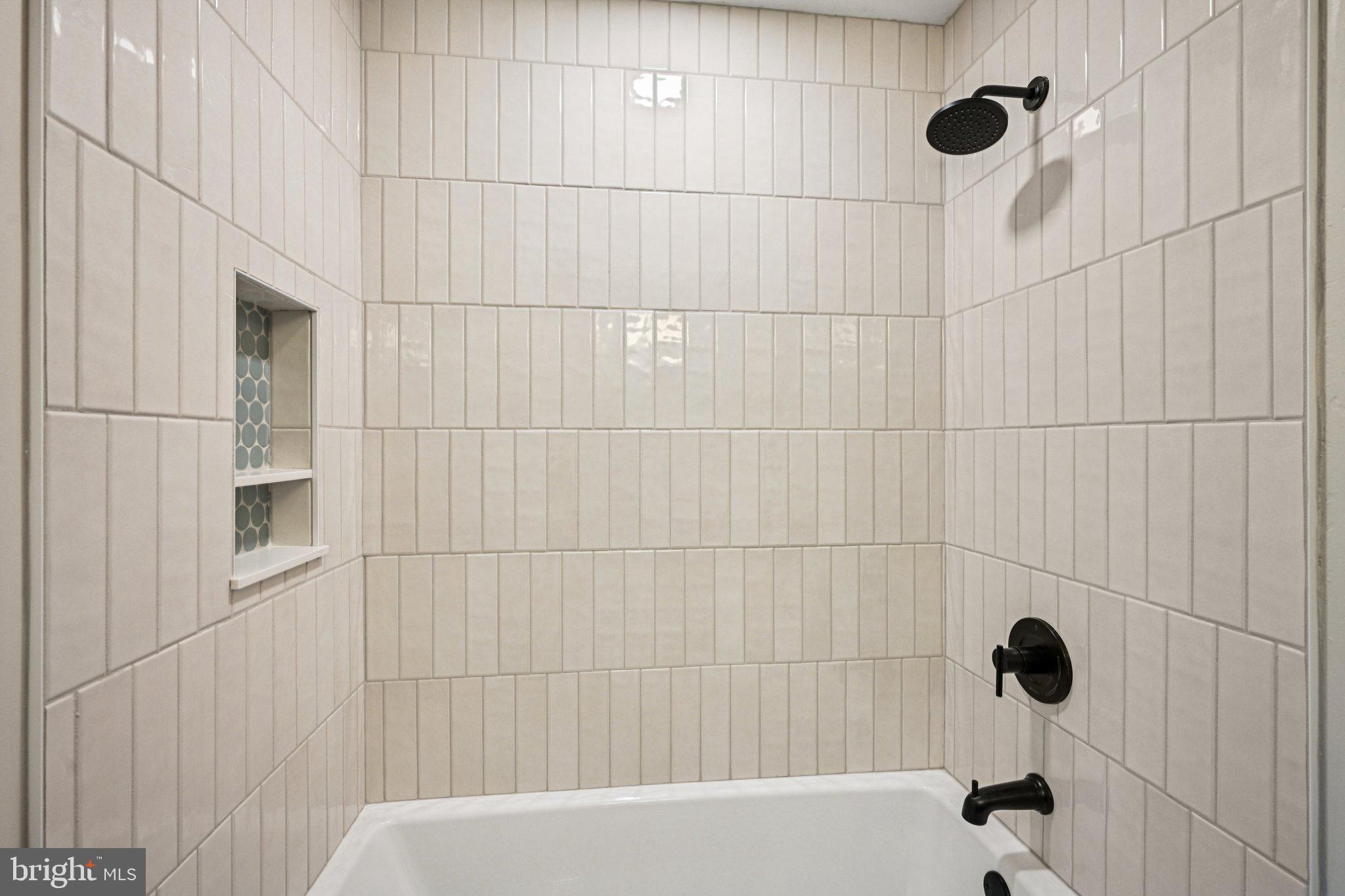 38 Ringfield Road Chadds Ford, PA 19317 - Photo 34 of 50 a bathroom with a bathtub