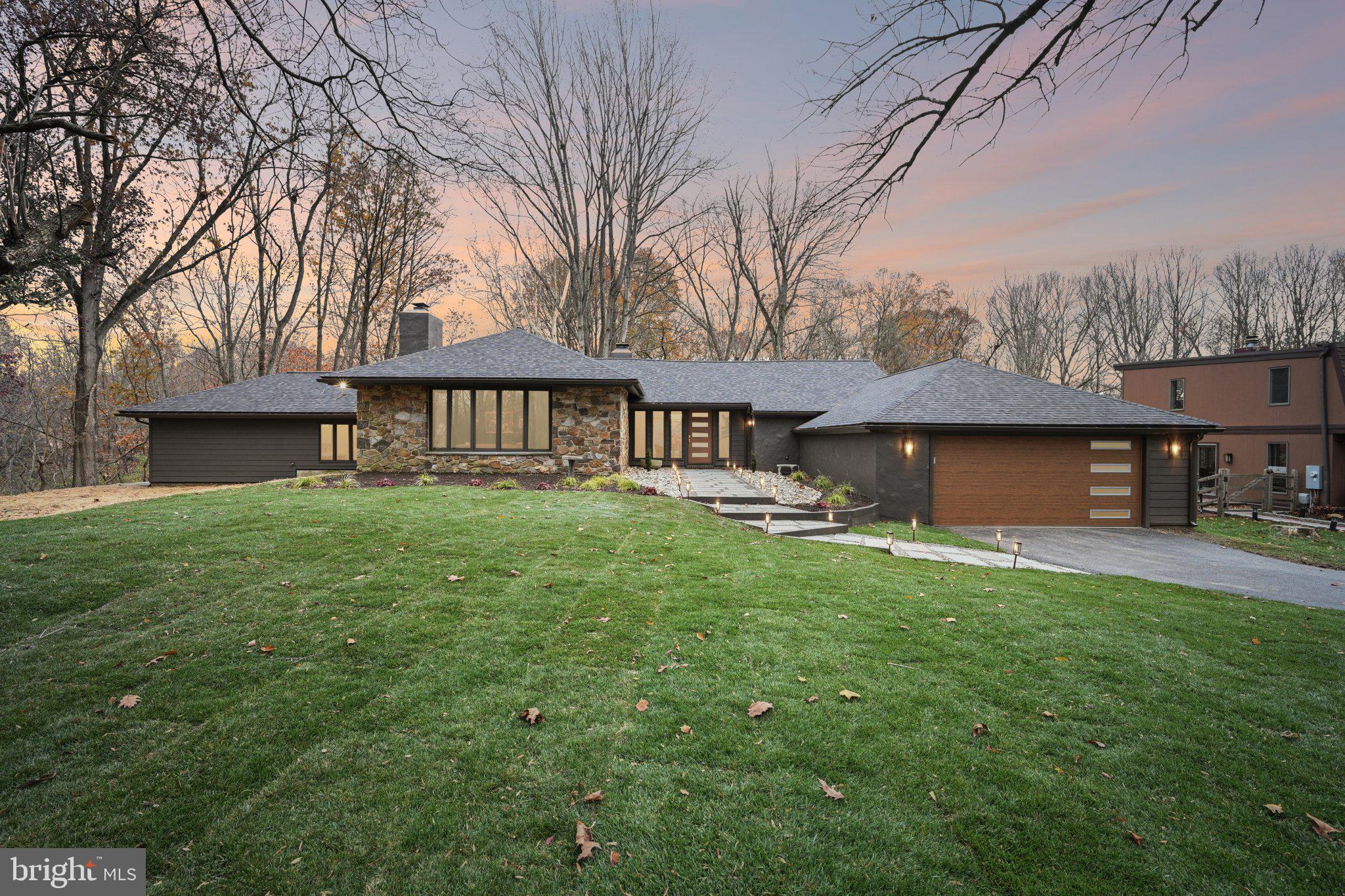 38 Ringfield Road Chadds Ford, PA 19317 - Photo 50 of 50 a front view of a house with garden