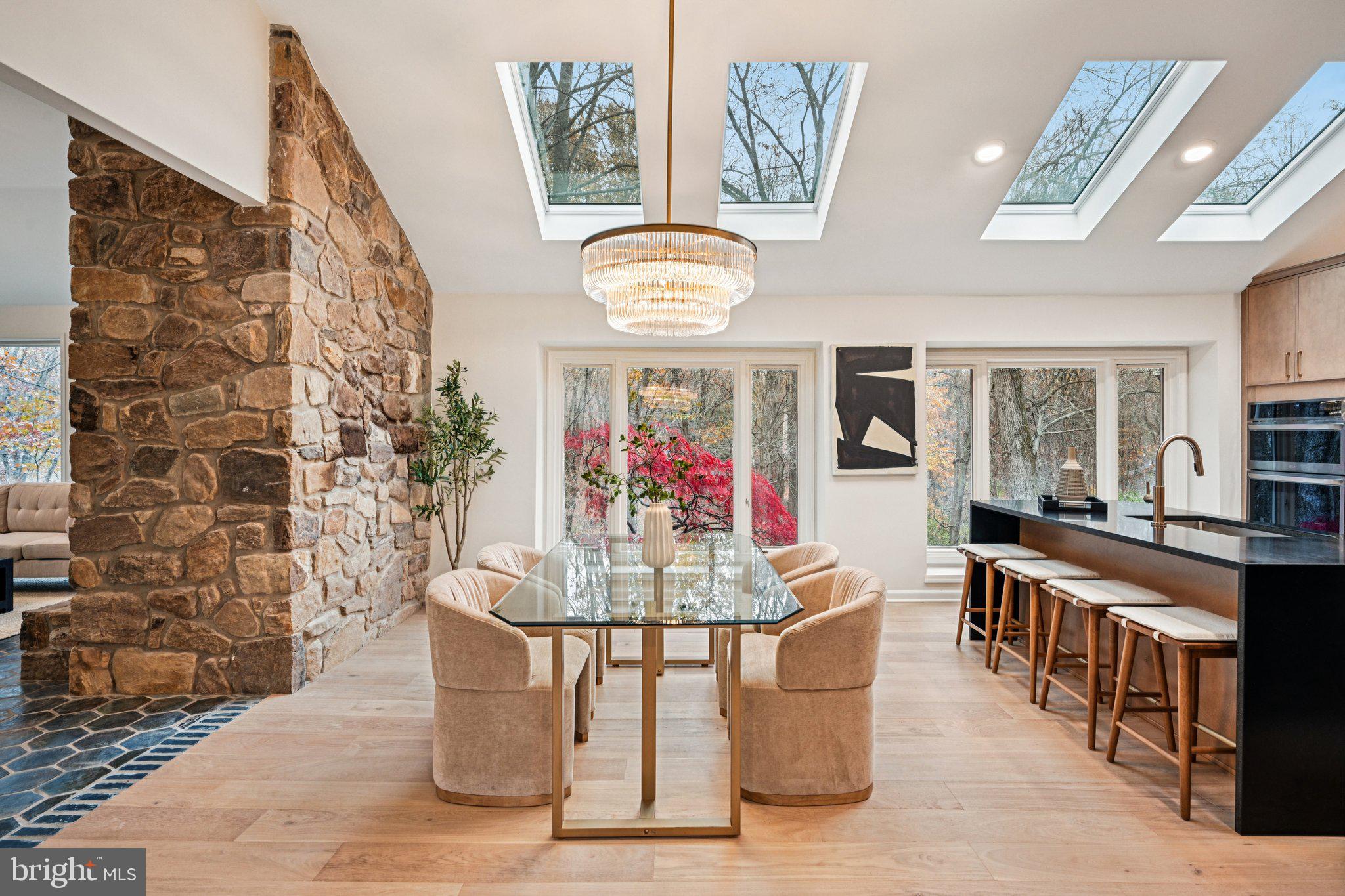 38 Ringfield Road Chadds Ford, PA 19317 - Photo 9 of 50 a dining room with chandelier fan and wooden floor