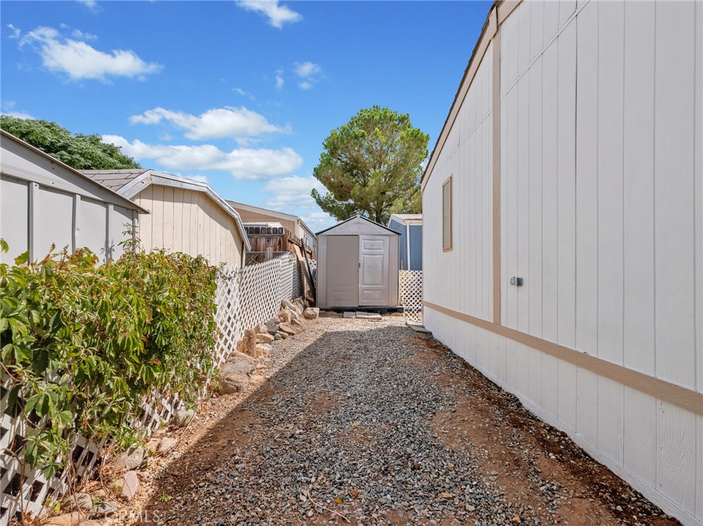22020 Nisqually Road, Unit 3 Apple Valley, CA 92308 - Photo 28 of 35 a view of a house with a yard