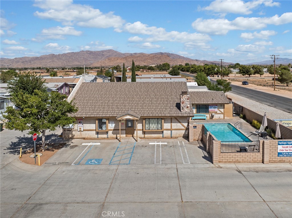 22020 Nisqually Road, Unit 3 Apple Valley, CA 92308 - Photo 30 of 35 a view of a terrace with sitting area