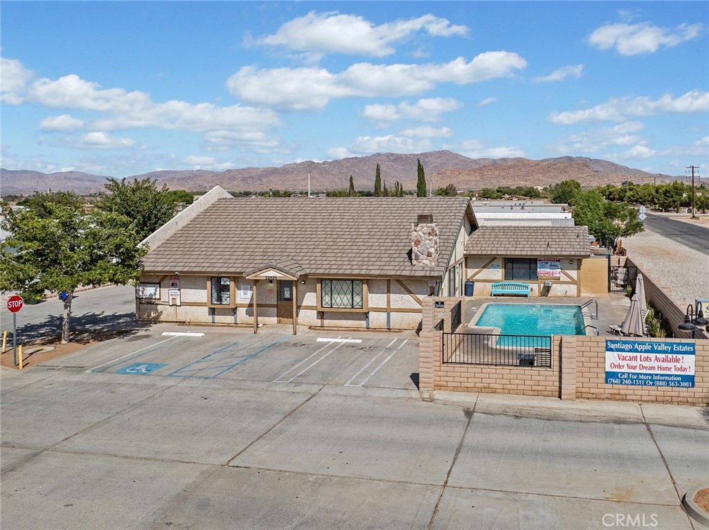 22020 Nisqually Road, Unit 3 Apple Valley, CA 92308 - Photo 32 of 35 an aerial view of multiple houses with a street