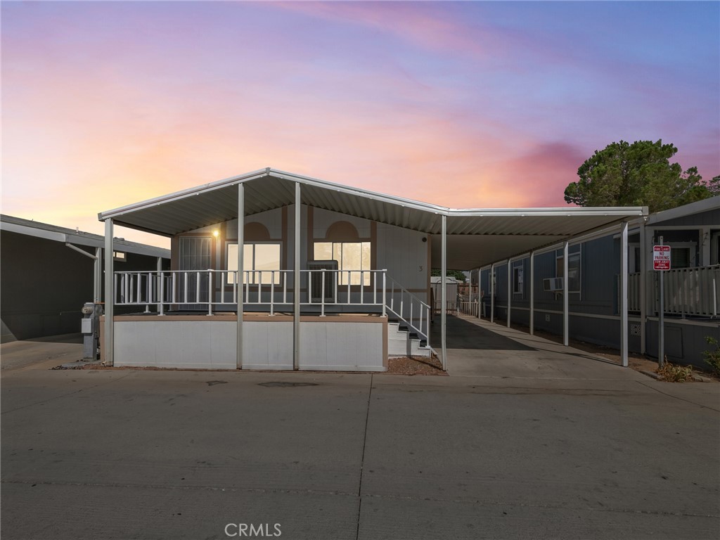 22020 Nisqually Road, Unit 3 Apple Valley, CA 92308 - Photo 34 of 35 a view of front door and deck