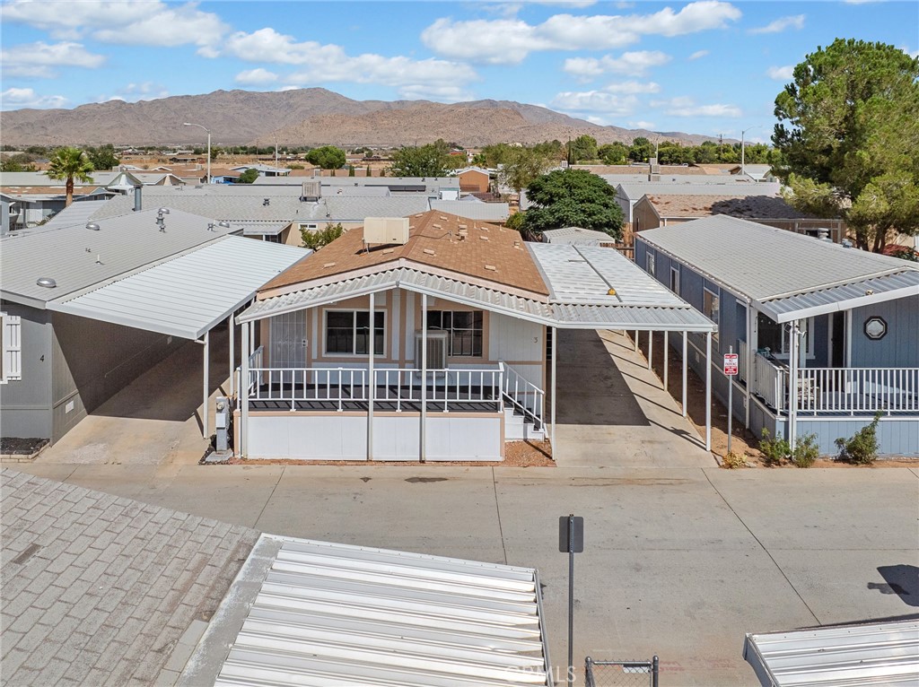 22020 Nisqually Road, Unit 3 Apple Valley, CA 92308 - Photo 5 of 35 an aerial view of a house with a yard
