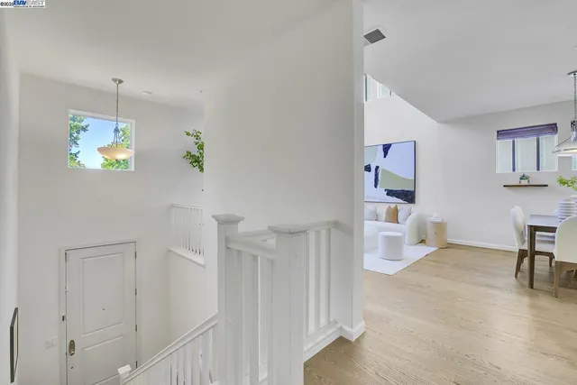 a view of kitchen with furniture and wooden floor