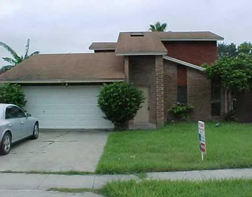 a house view with a garden space