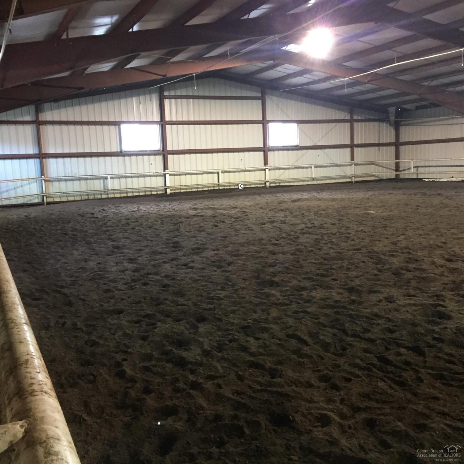 16075 Perit Huntington Road Sisters, OR 97759 - Photo 11 of 24 Arena with metal railings for protection