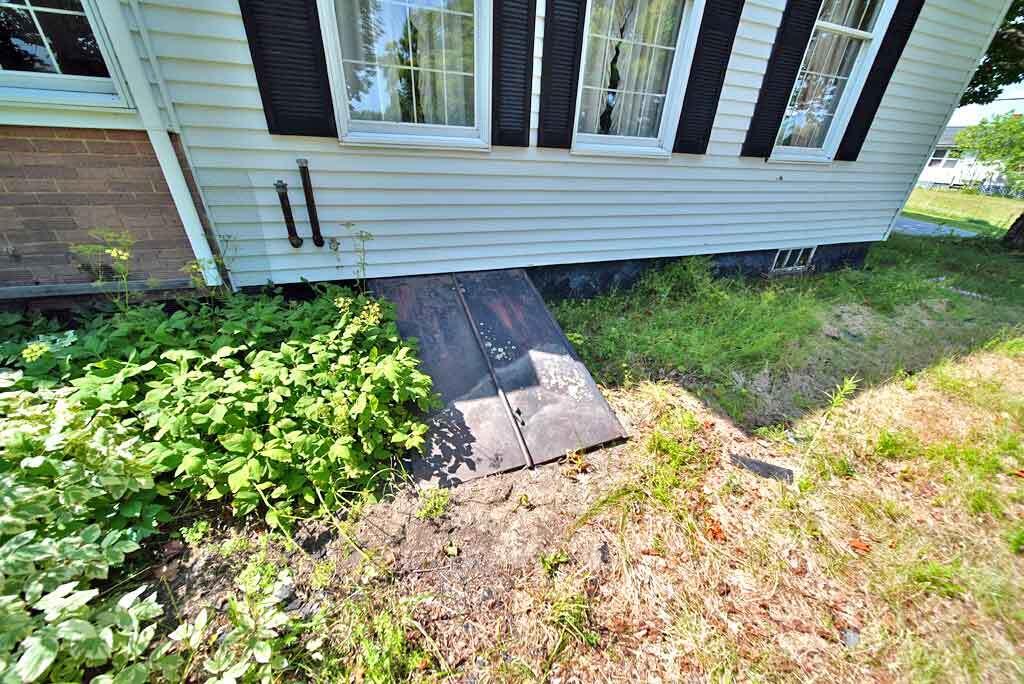 773 Main Street Wytopitlock, ME 04497 - Photo 39 of 56 bilco-doors-outside-entranc