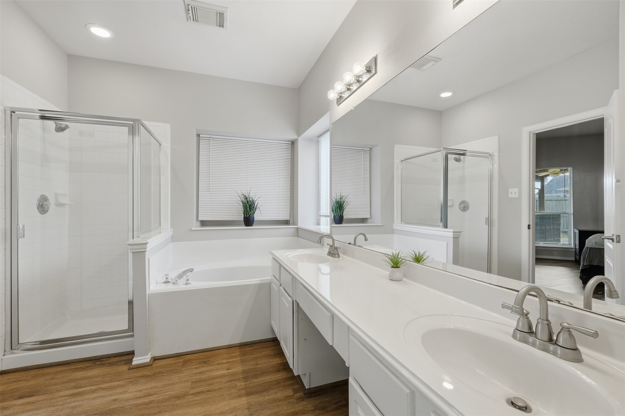 2202 Melanie Park Drive Spring, TX 77388 - Photo 15 of 26 a bathroom with a double vanity sink mirror double and bathtub