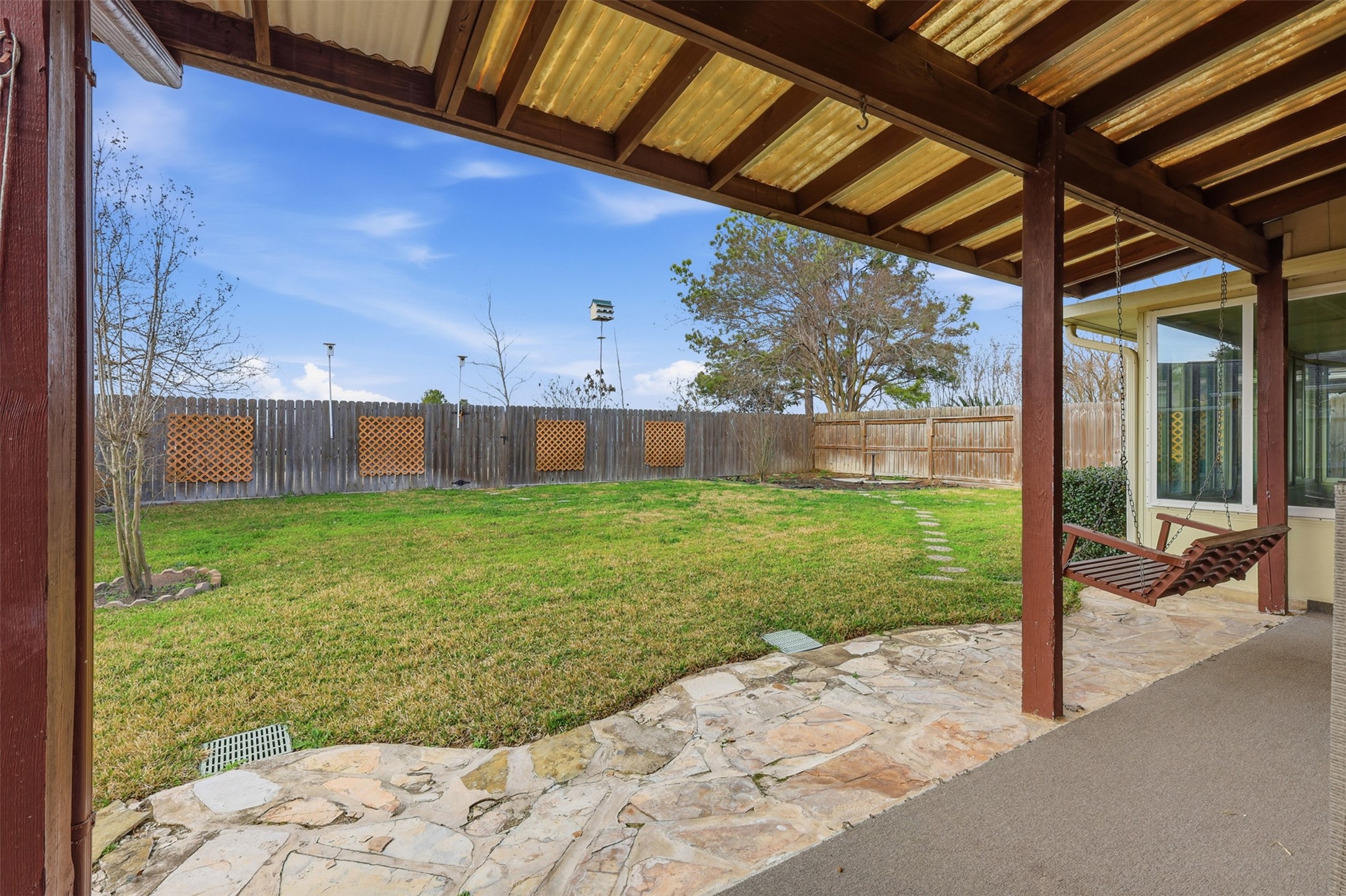 2202 Melanie Park Drive Spring, TX 77388 - Photo 19 of 26 a view of a porch with a backyard