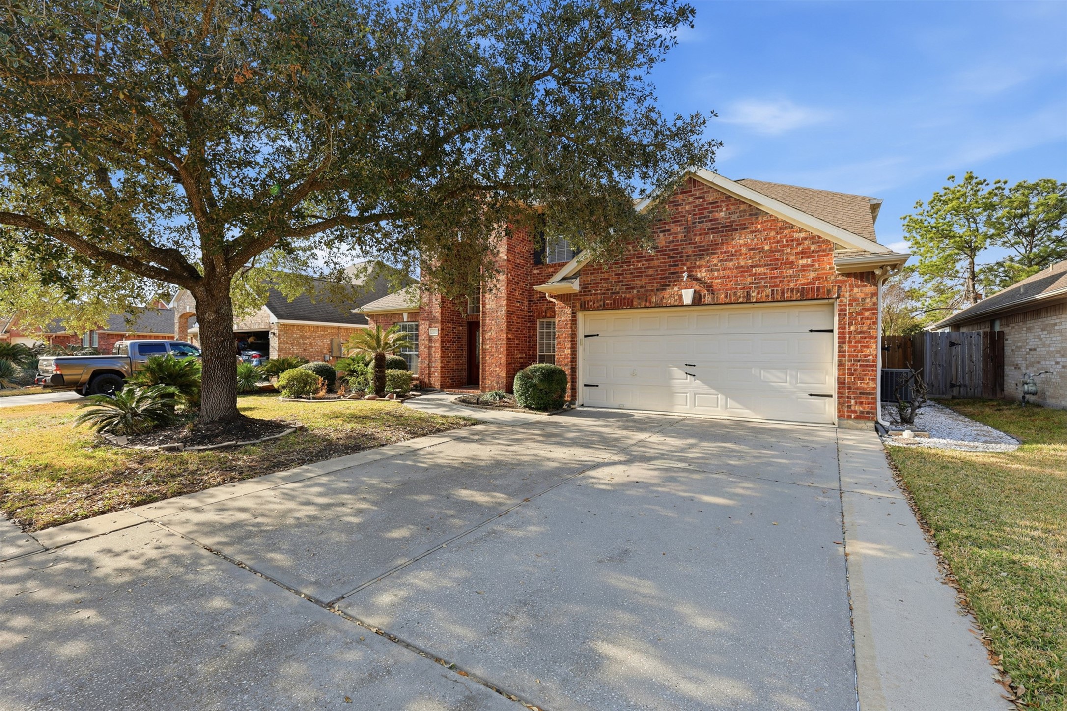2202 Melanie Park Drive Spring, TX 77388 - Photo 2 of 26 a view of street with parked cars