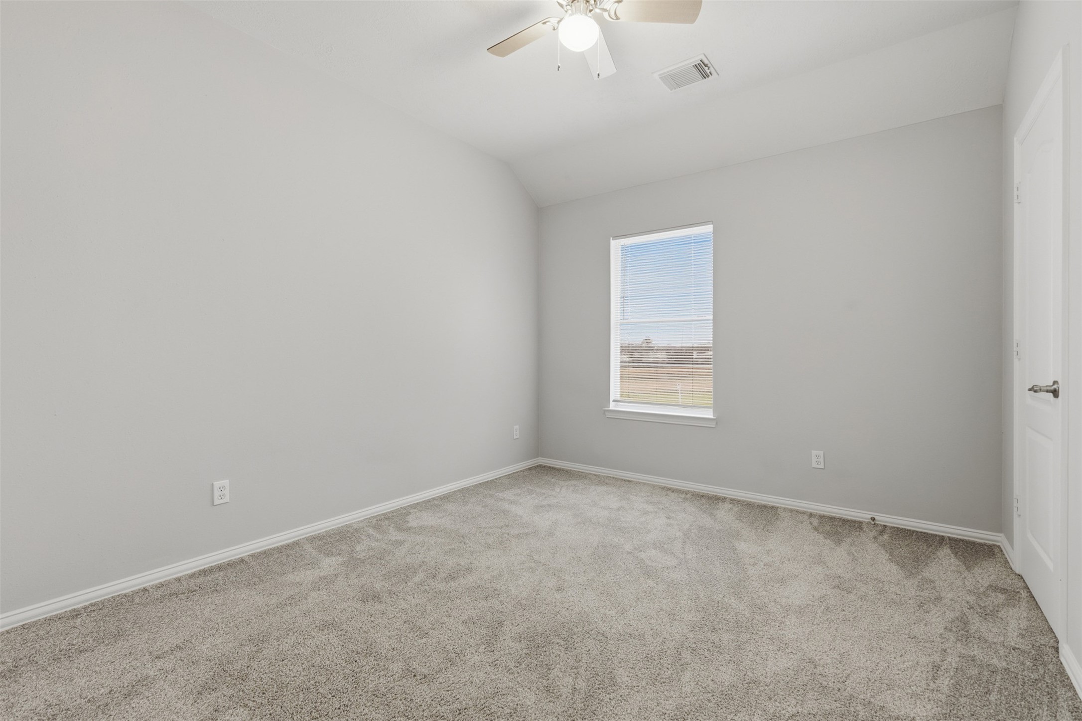 2202 Melanie Park Drive Spring, TX 77388 - Photo 23 of 26 an empty room with a chandelier fan