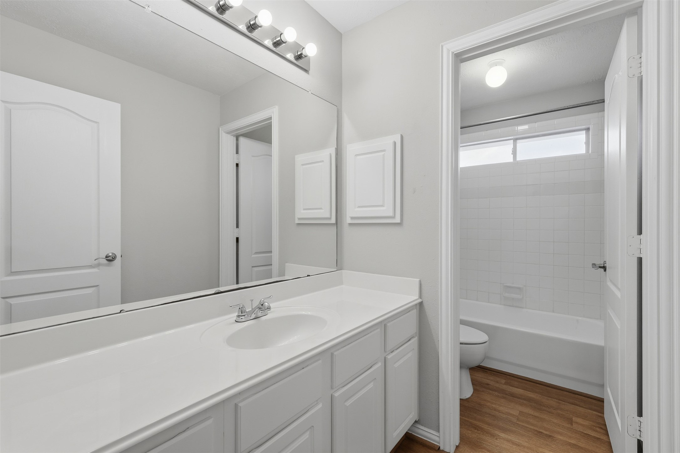 2202 Melanie Park Drive Spring, TX 77388 - Photo 25 of 26 a bathroom with a sink a toilet and shower