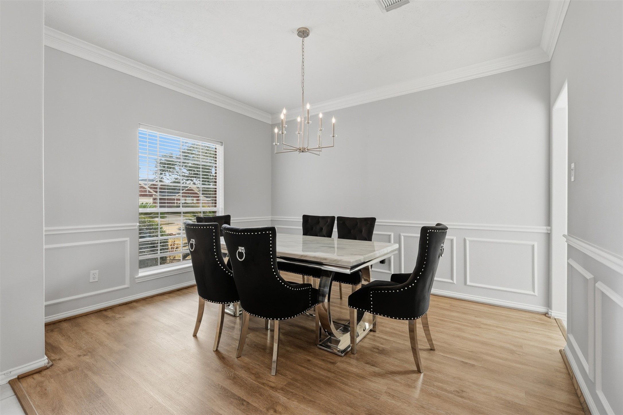 2202 Melanie Park Drive Spring, TX 77388 - Photo 6 of 26 a view of a dining room with furniture window and wooden floor