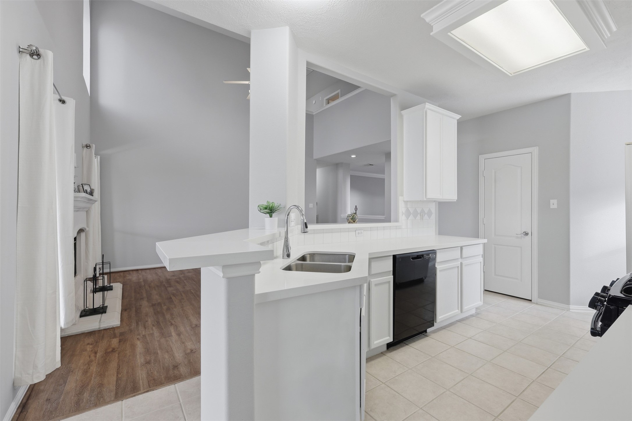 2202 Melanie Park Drive Spring, TX 77388 - Photo 8 of 26 a kitchen with stainless steel appliances granite countertop a sink stove and refrigerator