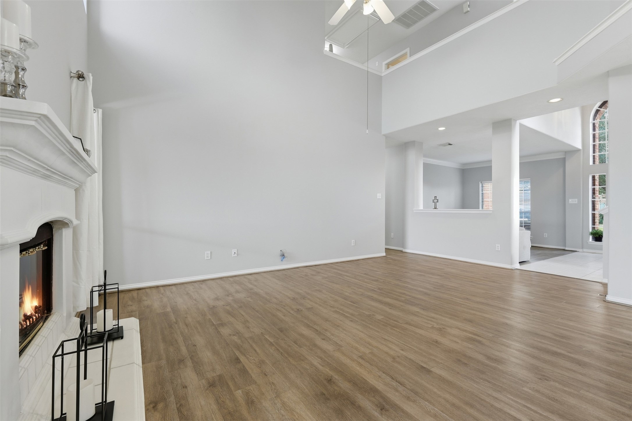 2202 Melanie Park Drive Spring, TX 77388 - Photo 10 of 26 a view of empty room with wooden floor and fan