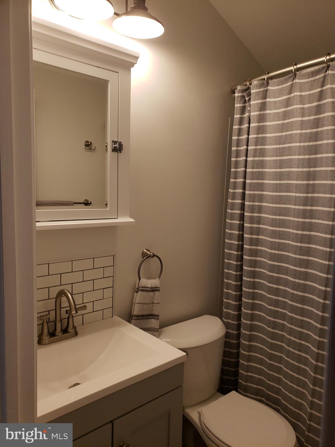 11 Verdant Road Levittown, PA 19057 - Photo 34 of 43 Upstairs bath with new vanity, floors and shower