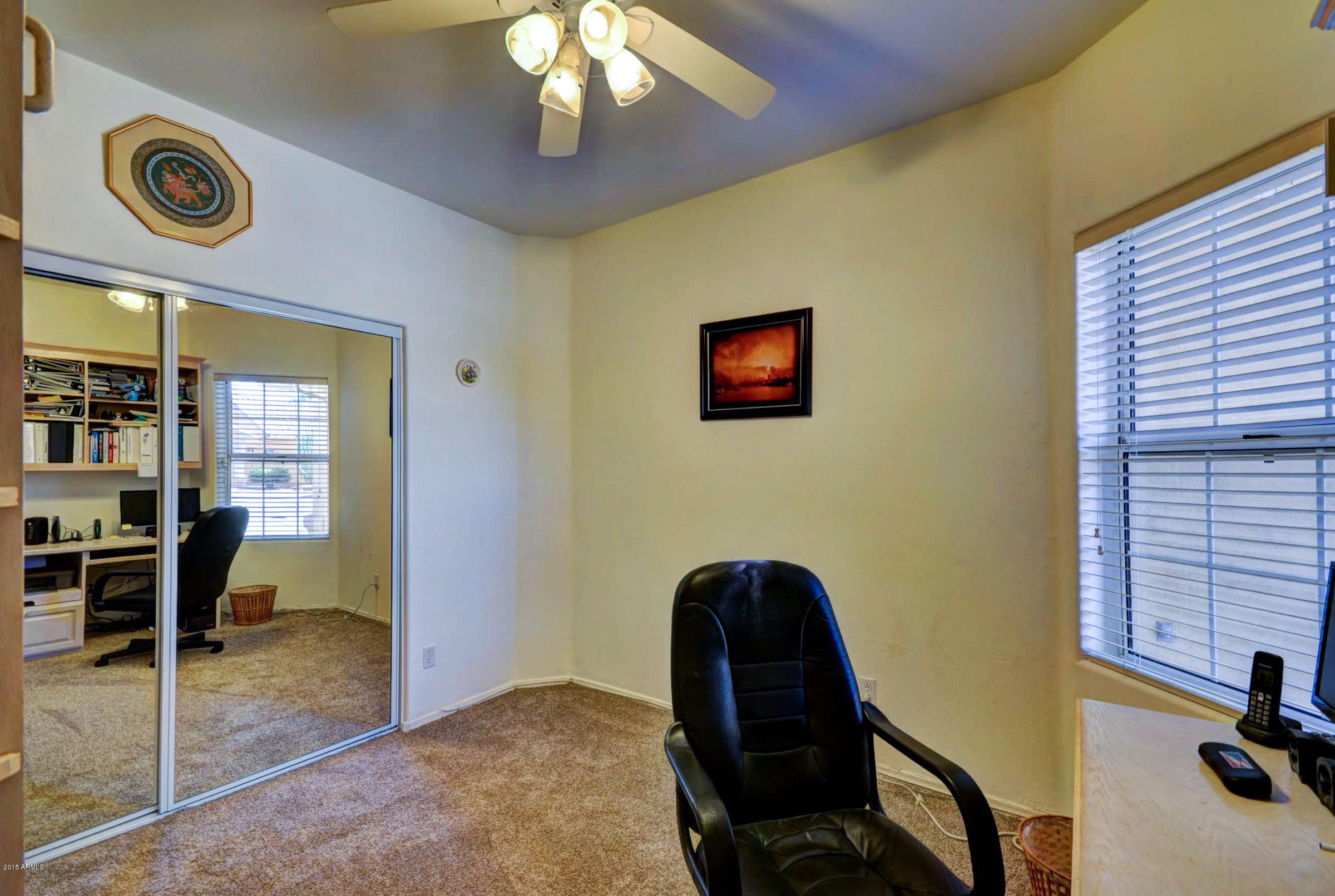 5311 East Danbury Road Scottsdale, AZ 85254 - Photo 29 of 39 a view of a workspace with furniture and a window