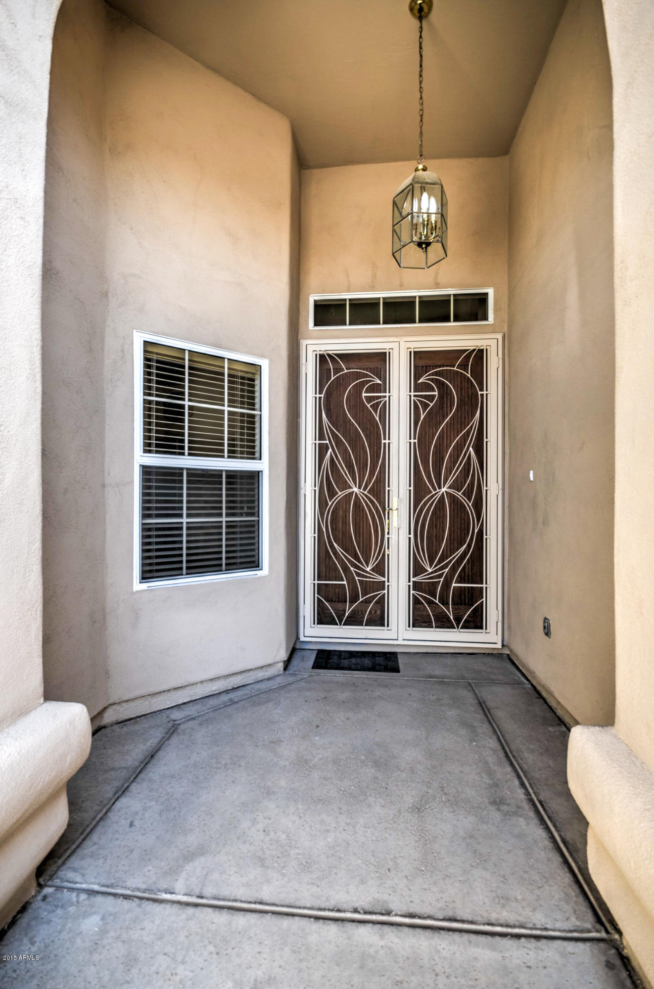 5311 East Danbury Road Scottsdale, AZ 85254 - Photo 4 of 39 a view of an empty room with a window