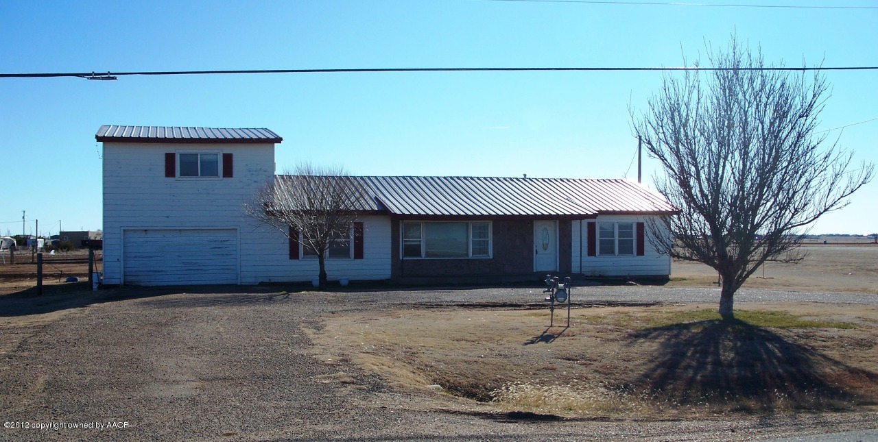1115 West McCormick Road Amarillo, TX 79118 - Photo 1 of 15 a backyard of a house