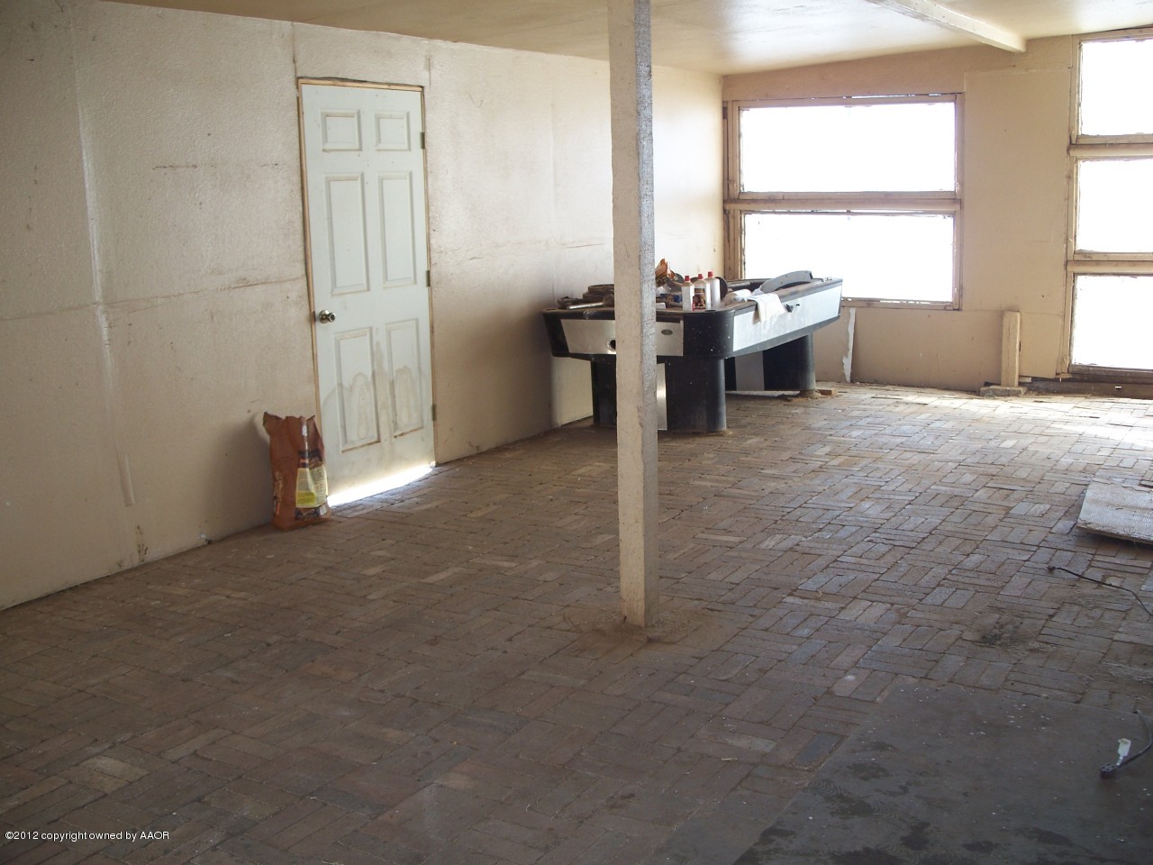 1115 West McCormick Road Amarillo, TX 79118 - Photo 13 of 15 a view of empty room with large windows