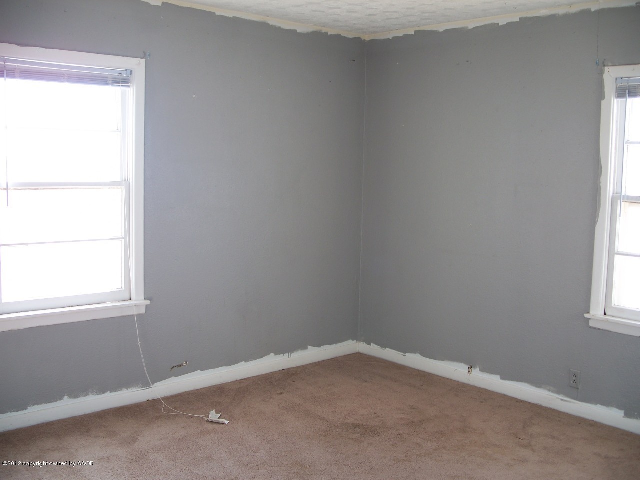 1115 West McCormick Road Amarillo, TX 79118 - Photo 10 of 15 an empty room with a window