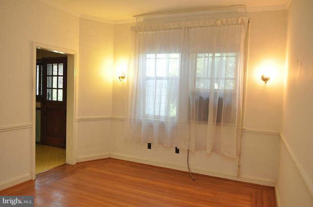 3909 Keswick Road Baltimore, MD 21211 - Photo 12 of 23 a view of a bathroom with wooden floor