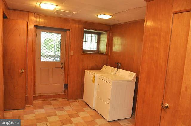 3909 Keswick Road Baltimore, MD 21211 - Photo 20 of 23 a utility room with dryer and washer