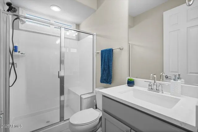 a living room with furniture gym equipment and a window