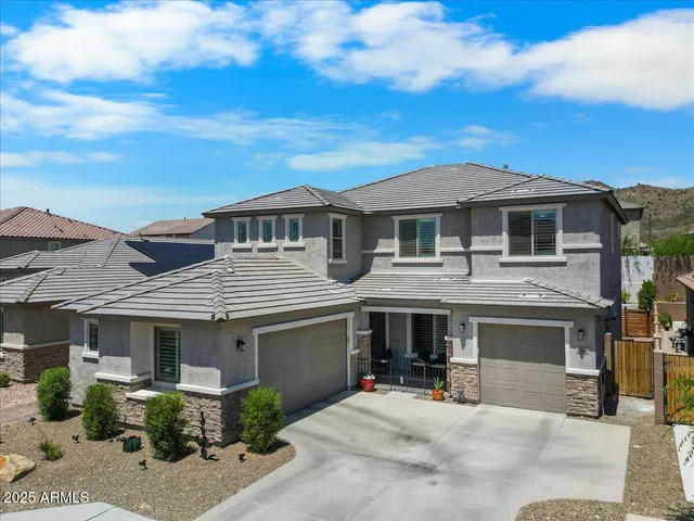 a front view of a house with a porch