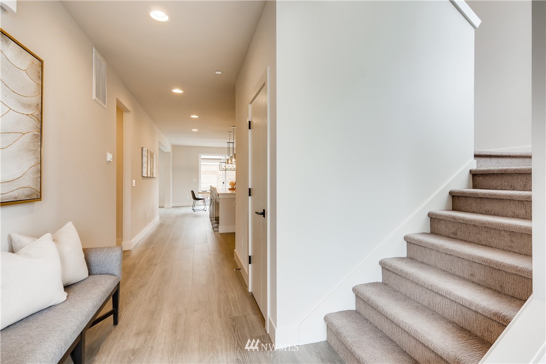 3821 208th Place Southeast Bothell, WA 98021 - Photo 15 of 28 a view of entryway and hall with wooden floor