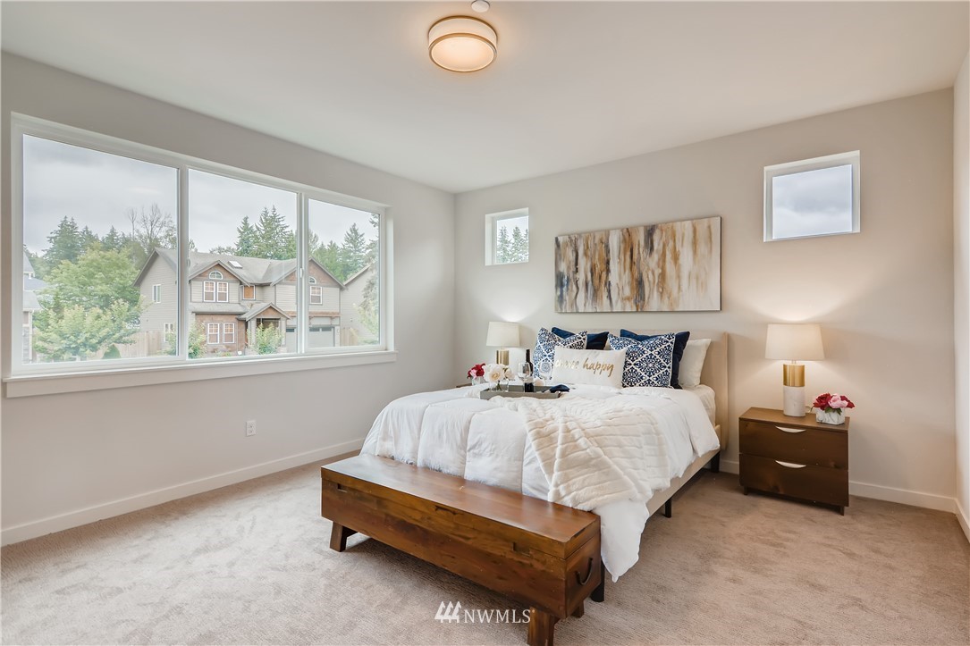 3821 208th Place Southeast Bothell, WA 98021 - Photo 16 of 28 a bedroom with bed and window
