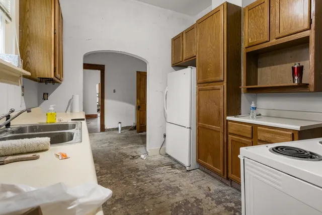 a view of a kitchen and a sink