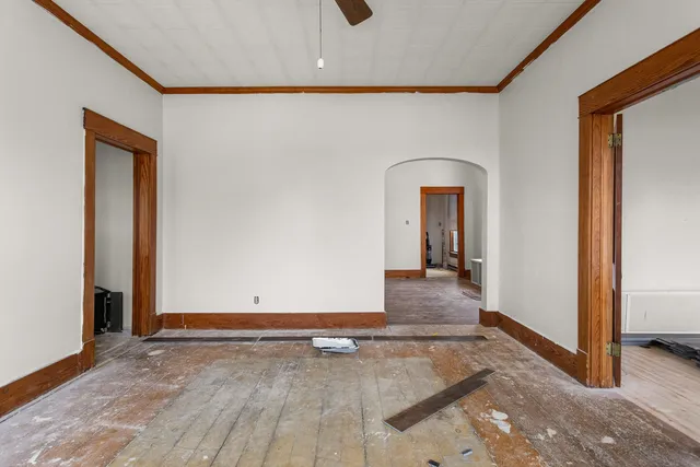 a living room with furniture fireplace and a flat screen tv