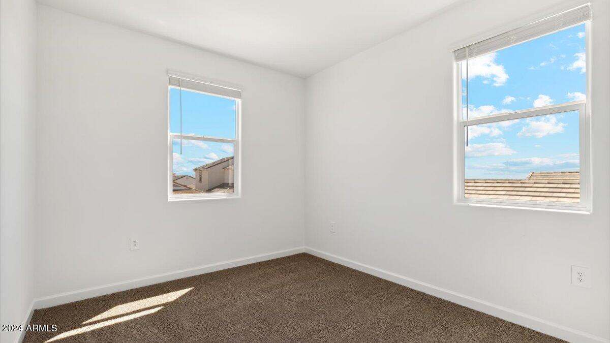 9202 South Palo Verde Drive Apache Junction, AZ 85120 - Photo 16 of 24 an empty room with a window