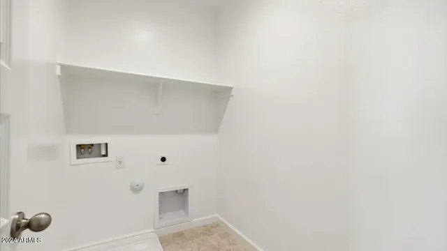 a view of white cabinet with a white cabinet