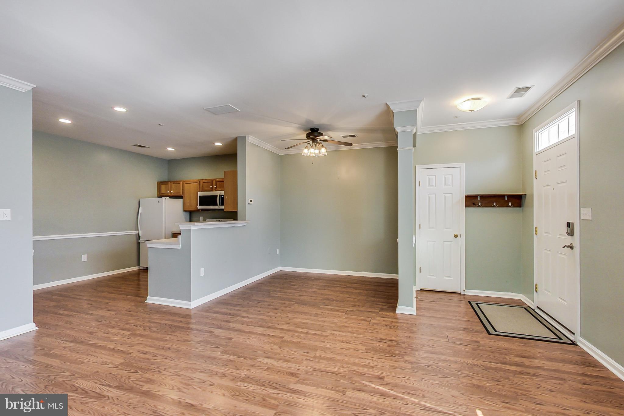 8716 Autumn Ridge Court Odenton, MD 21113 - Photo 4 of 42 Living & Dining Areas