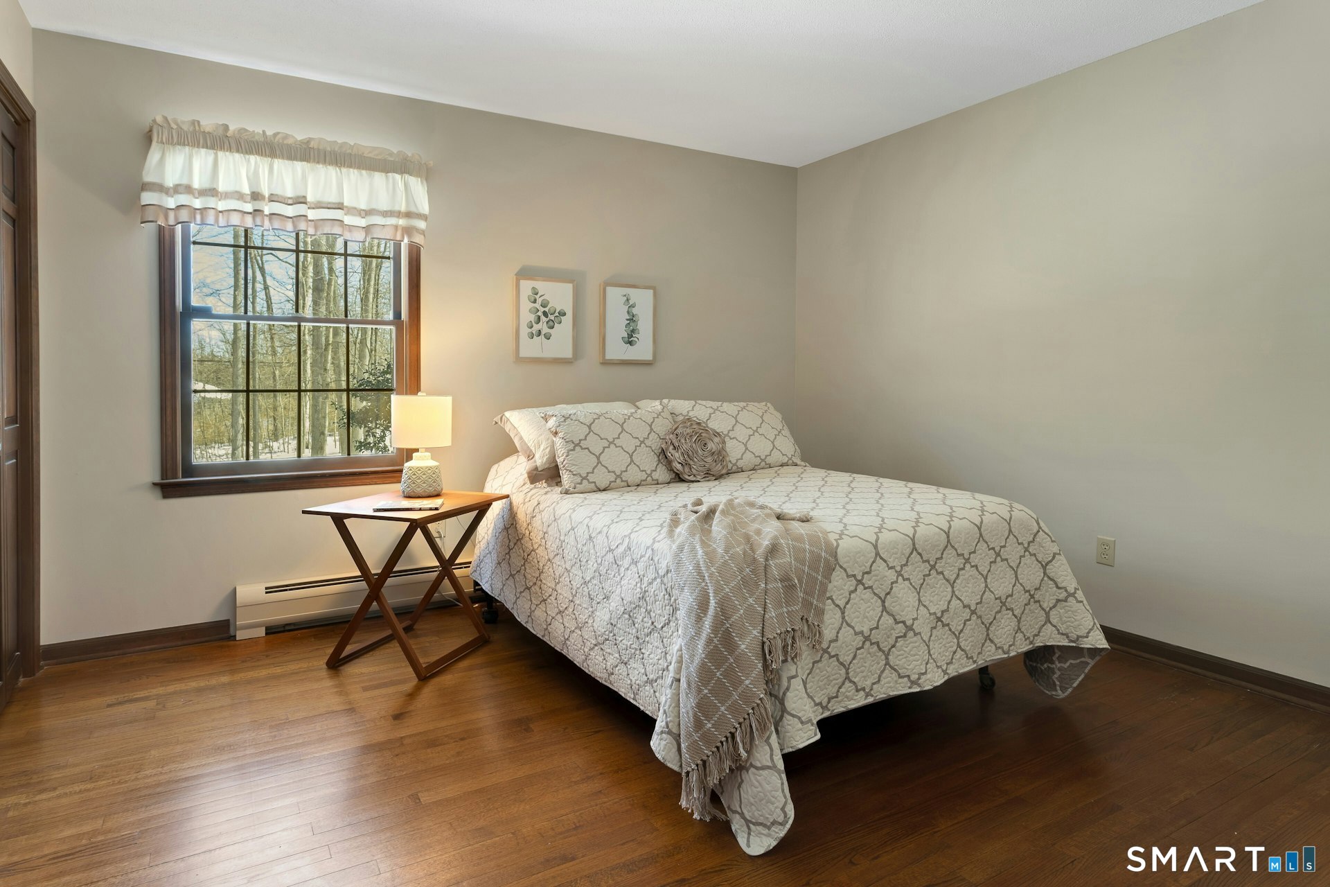 295 Judd Road Easton, CT 06612 - Photo 12 of 33 a bedroom with a bed and a window